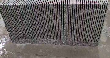 上海芝麻白毛板荒料切割